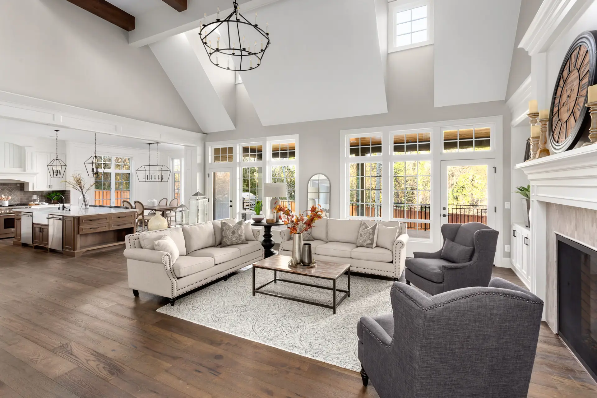 Open concept multi-room renovation in Vancouver featuring a modern living room and integrated kitchen design.